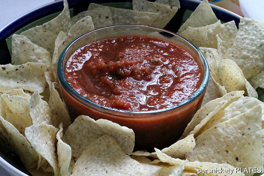 On the Border salsa is a delicious Mexican salsa, served at On the Border restaurant. This super simple blender salsa recipe tastes just like On the Border's! copycat on the border salsa and tortilla chips