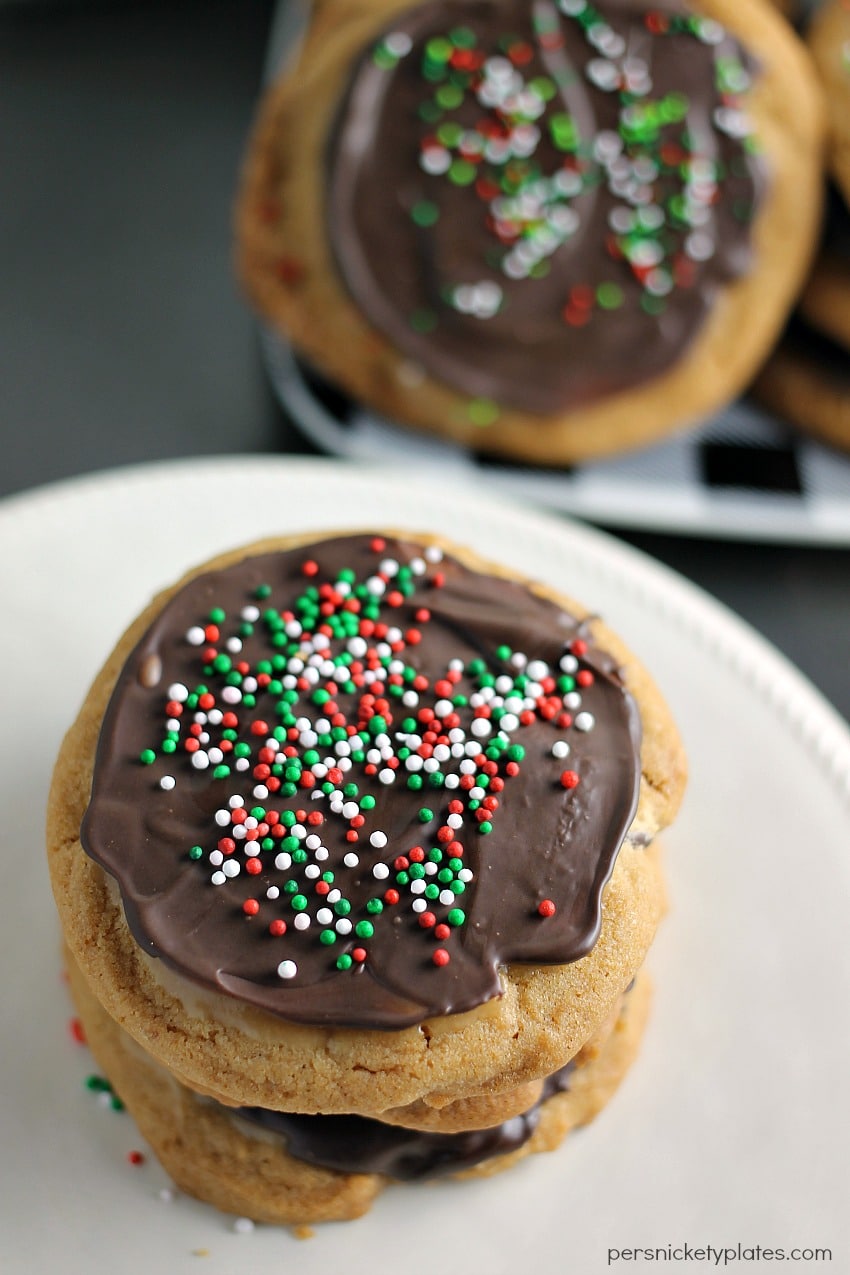 A brown butter chocolate chip cookie slathered with a layer of salted caramel then topped with chocolate and sprinkles. | Persnickety Plates