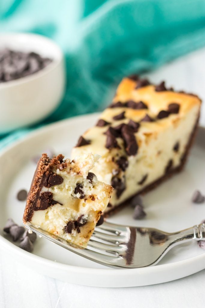 bite of cheesecake on a fork.