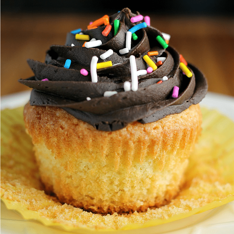 Vanilla Cupcakes made from scratch should be a staple recipe in every bakers' arsenal. This recipe makes a small batch perfect to satisfy a craving. | www.persnicketyplates.com