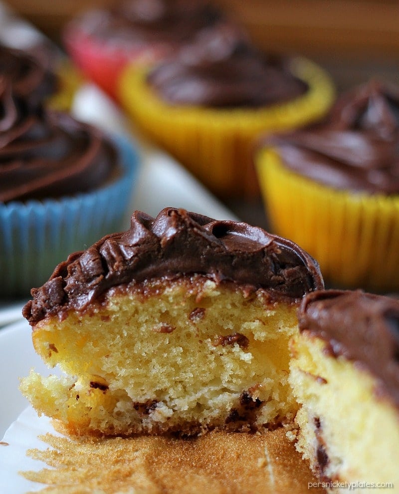 Cheesecake Filled Cupcakes are super simple starting with a cake mix but filled with chocolate chip cheesecake mixture in the centers! | www.persnicketyplates.com