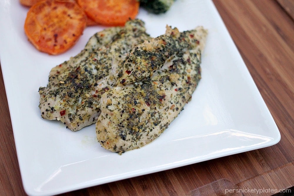 Baked chicken with garlic, basil and parsley Simple baked chicken with garlic, basil and parsley that's full of flavor and make an easy weeknight dinner option.