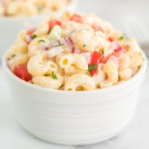 white bowl of classic macaroni salad