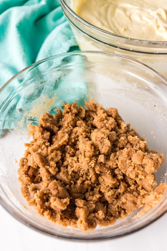 cinnamon crumble in a glass mixing bowl.