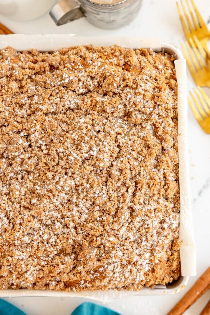 overhead shot of coffee cake sprinkled with powdered sugar.