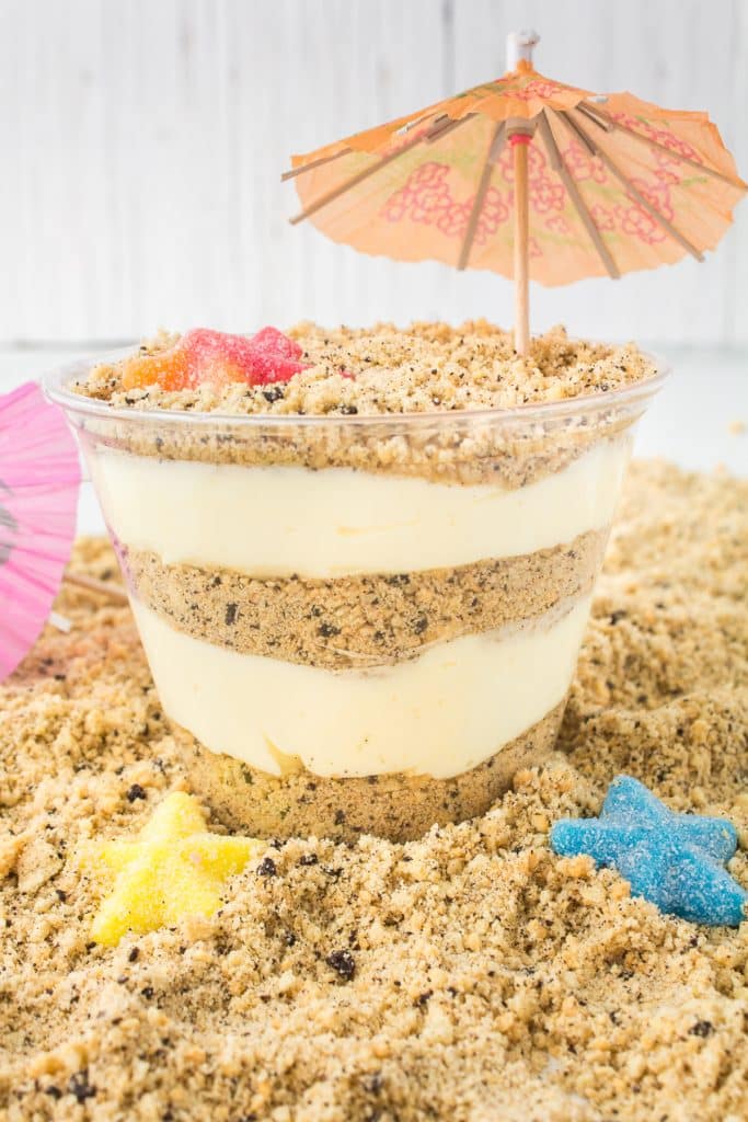 layered sand pudding cup with star gummies.