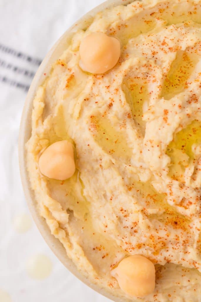 closeup shot of bowl of hummus.
