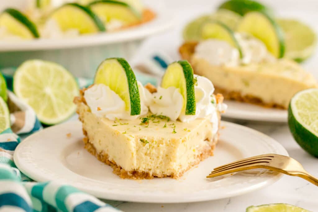 slice of key lime pie with a bite missing.