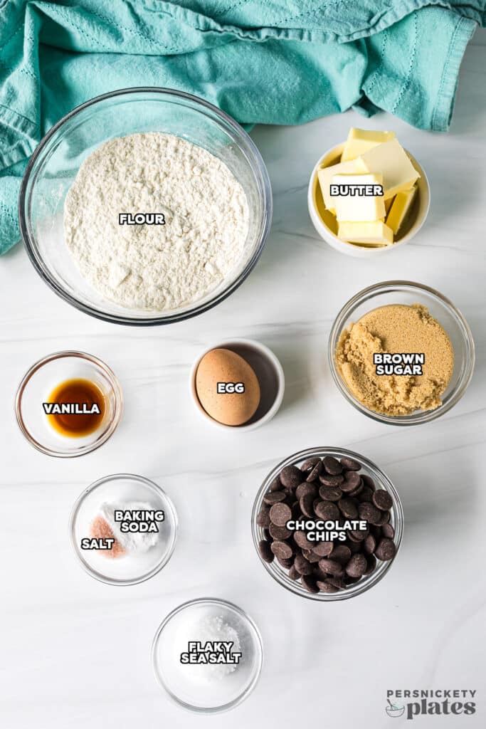 overhead shot of labeled ingredients laid out to make chocolate chip cookie cups.