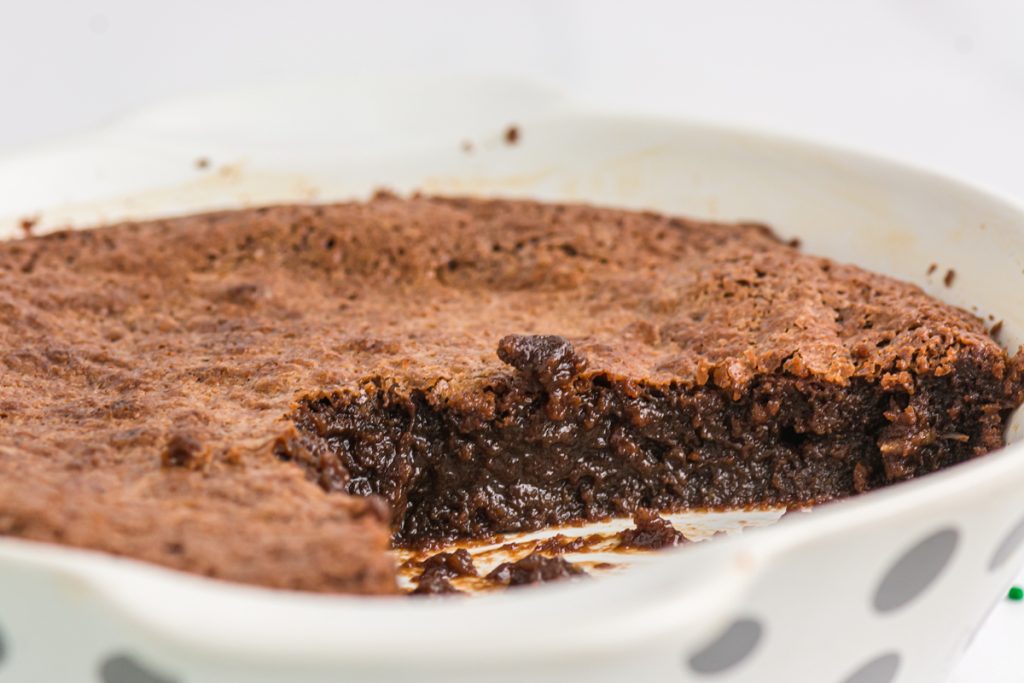 side view of a gooey fudge pie. 