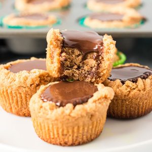 peanut butter cookie cup with a bite taken out of it.