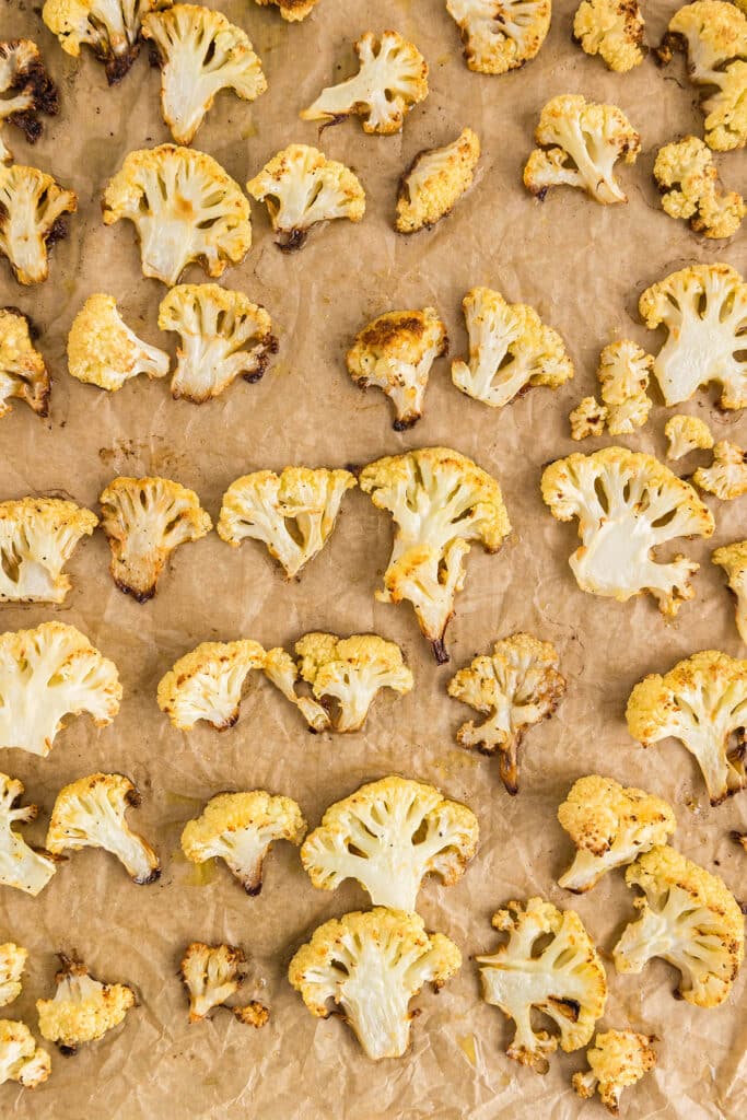 roasted cauliflower on a baking sheet.