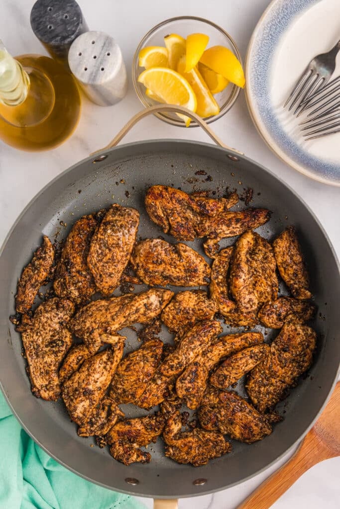 zaatar chicken in a skillet.