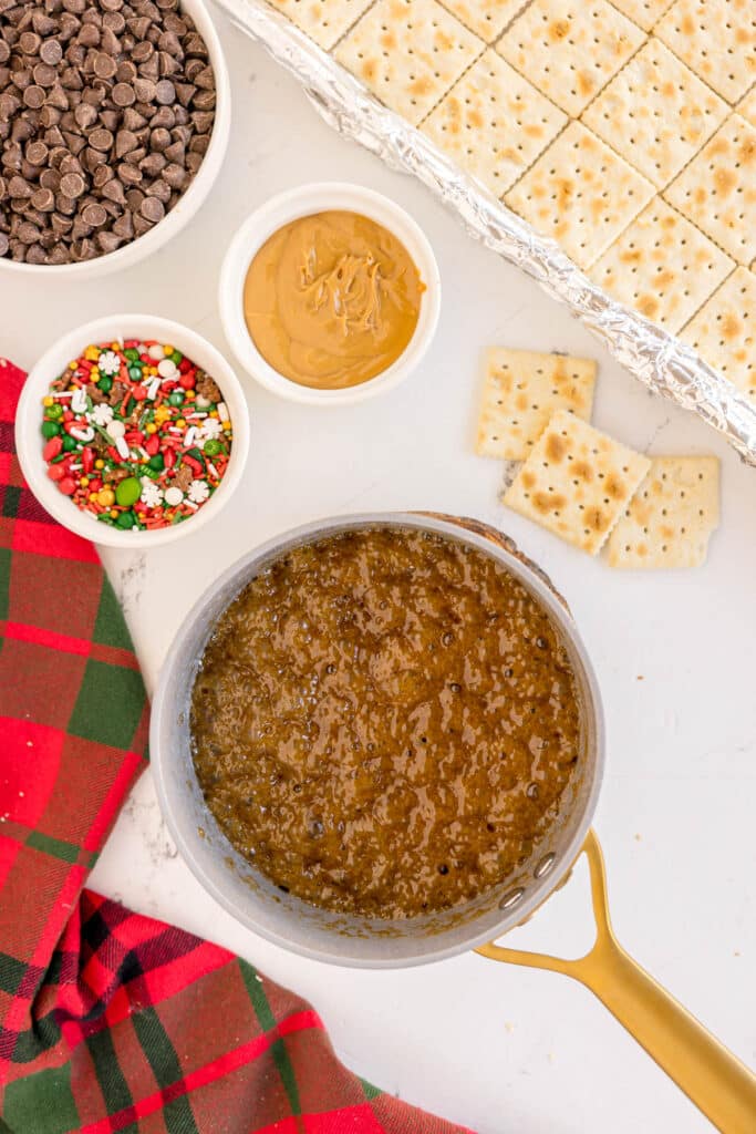 overhead shot of bubbling toffee in a saucepan.