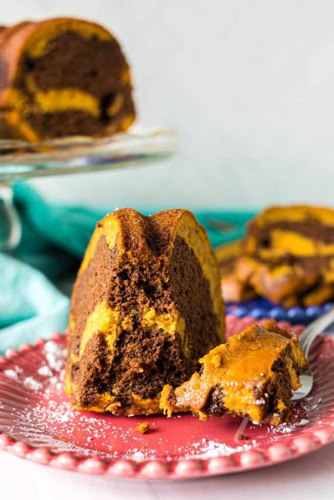 slice of marble cake with a bite missing.