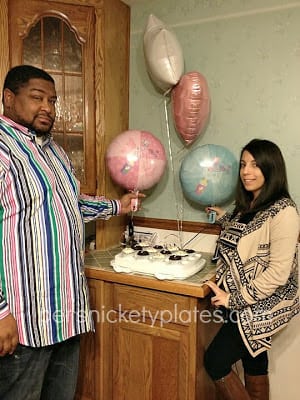 Dark chocolate gender reveal cupcakes filled with pink (or blue) frosting. A fun way to reveal baby's gender! | www.persnicketyplates.com