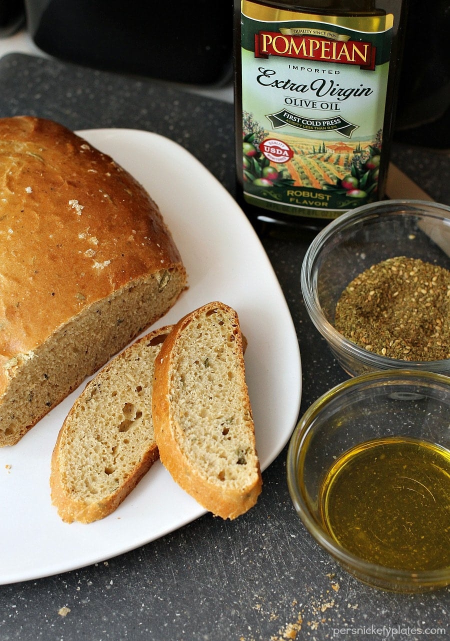 Rosemary Olive Oil Bread is light and flavorful and easy to make. This homemade bread is perfect served warm with a pat of creamy butter. Nothing much is better than fresh baked bread.