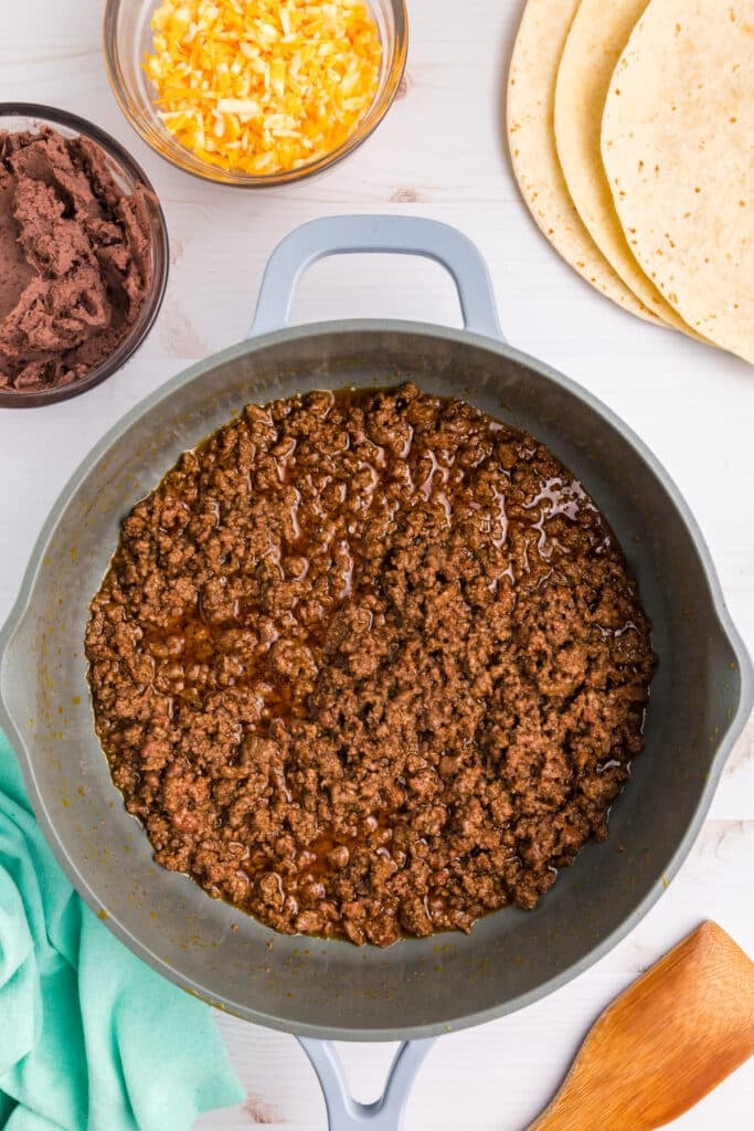 overhead shot of ground beef in a skillet.