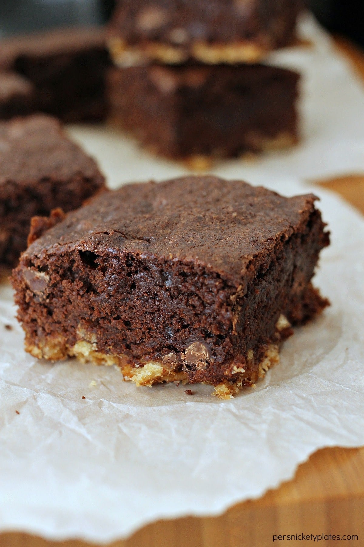 Pretzel Crusted Brownies single pretzel crusted brownie on parchment paper