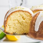 slice of 7 up cake being pulled bundt cake.