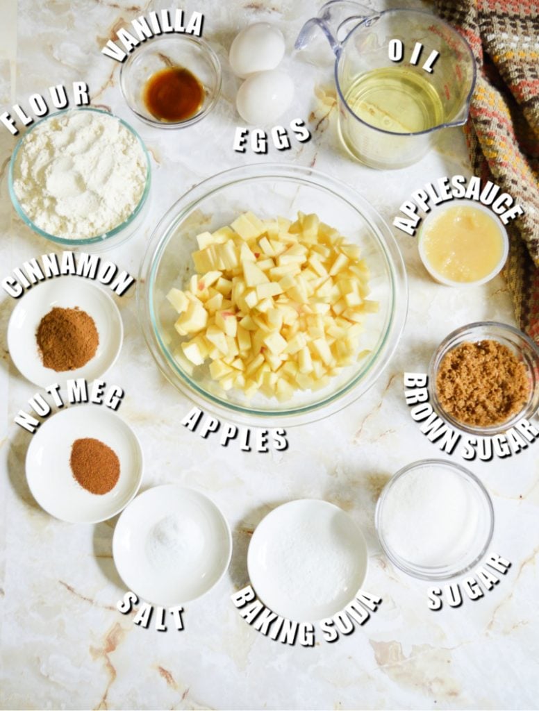 overhead shot of ingredients laid out in bowls to make apple bundt cake.