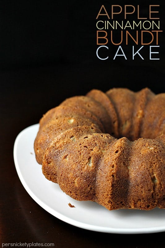 apple cinnamon bundt cake on white platter apple bundt cake on a white platter with title text overlay