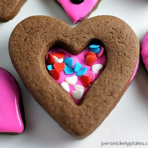 chocolate heart cookie topped with sprinkles
