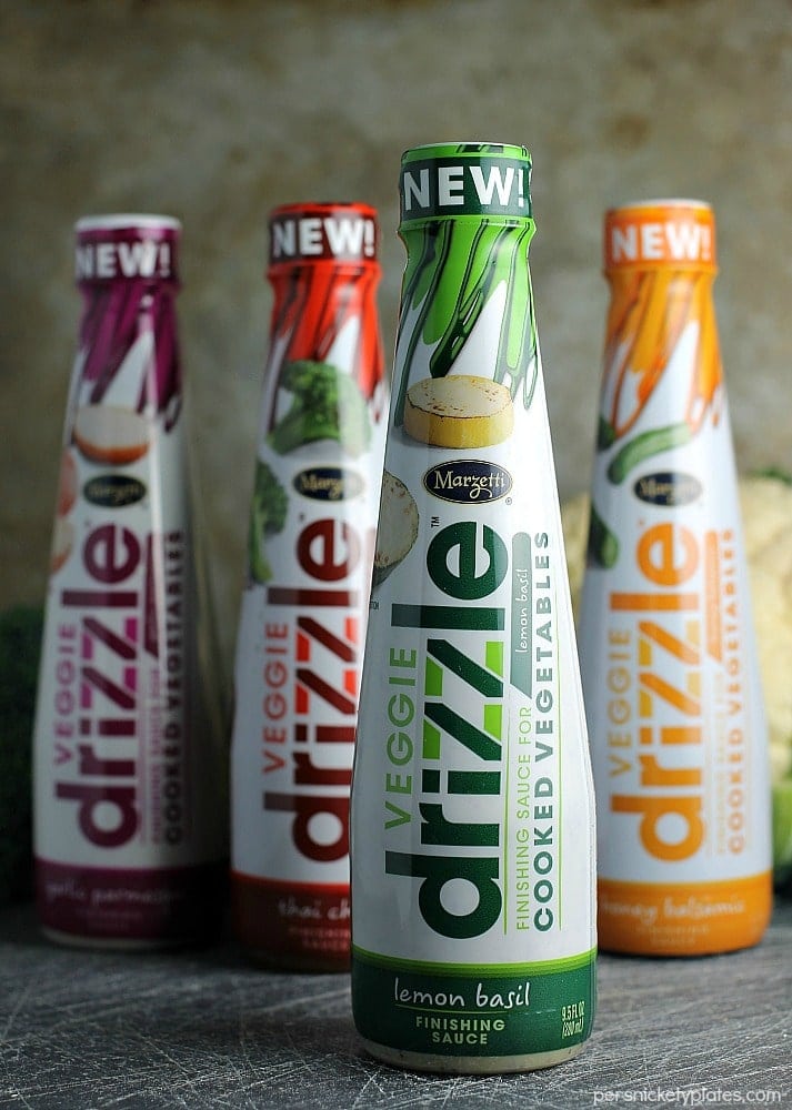 Simple blend of roasted broccoli, cauliflower, and zucchini flavored with dollops of Marzetti Lemon Basil finishing sauce. | Persnickety Plates AD