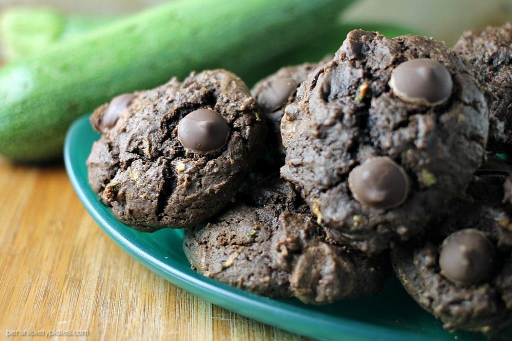 Chocolate Zucchini Drop Cookies are a sweet way to use up some of your zucchini crop. You end up with a moist, chocolatey cookie that's filled with chocolate chips but you don't even have to get out your mixer! | Persnickety Plates