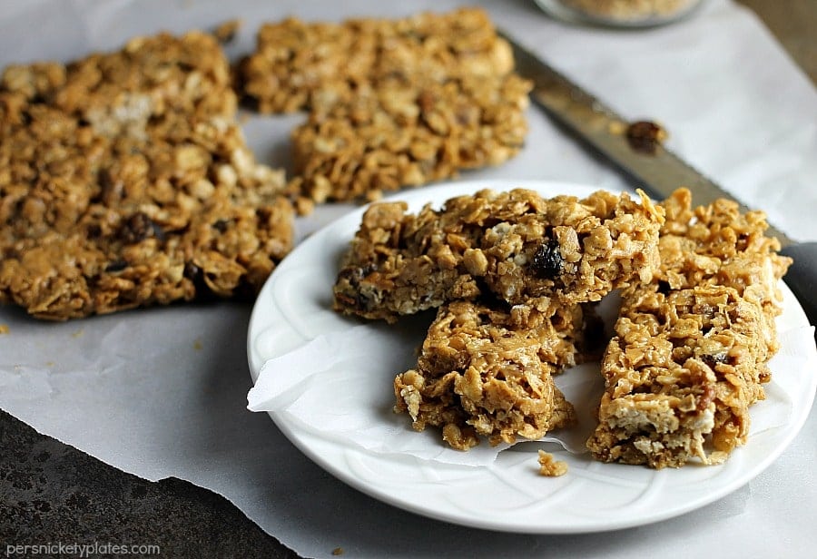 No Bake Chewy Granola Bars filled with peanut butter, honey, raisins, dates, and pecans are a healthy start to your day. With only five ingredients, you can whip them up in no time! | www.persnicketyplates.com