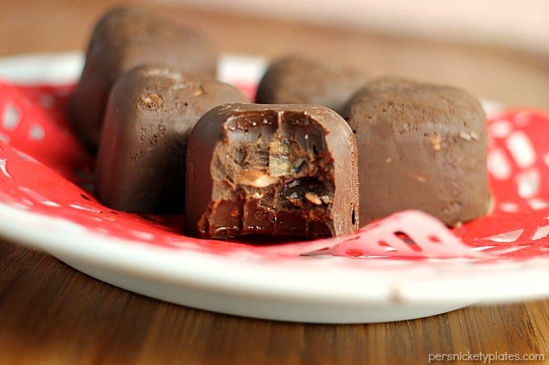 Dark Chocolate Toasted Almond and Coconut Hearts are a sweet, homemade goody perfect for Valentine's Day or anytime you want to treat yourself. | www.persnicketyplates.com