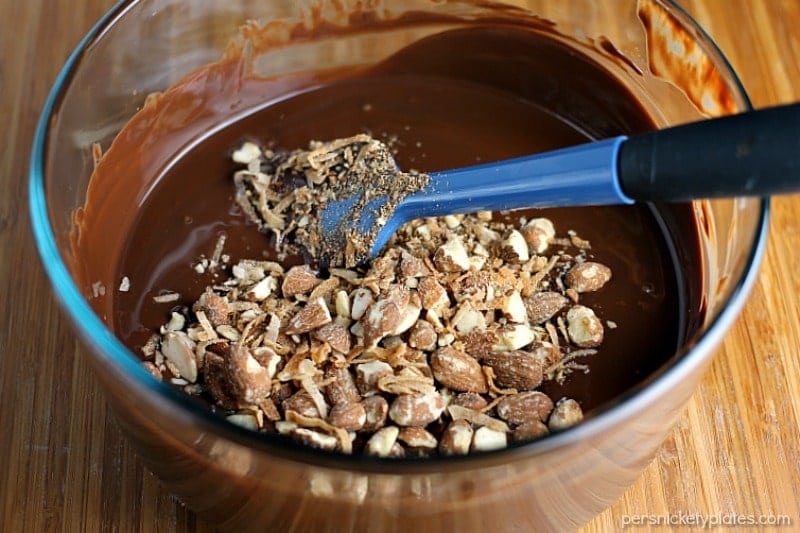 Dark Chocolate Toasted Almond and Coconut Hearts are a sweet, homemade goody perfect for Valentine's Day or anytime you want to treat yourself. | www.persnicketyplates.com