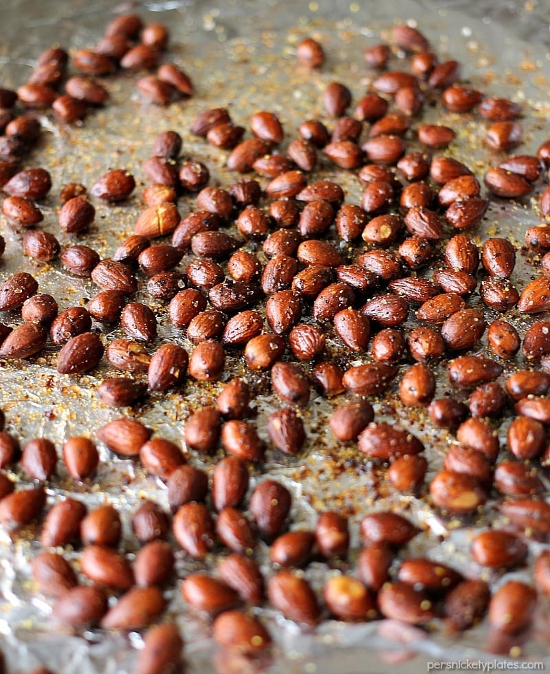Lemon Pepper Almonds are a healthy and easy snack. They only take a few minutes to put together but they're full of flavor and protein to keep you full! | www.persnicketyplates.com