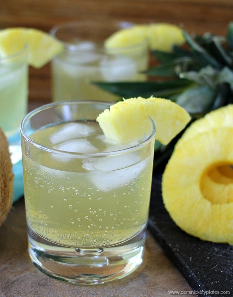 Skinny Pineapple Coconut Cocktail is a fizzy, low calorie drink that is perfect for summertime. | www.persnicketyplates.com