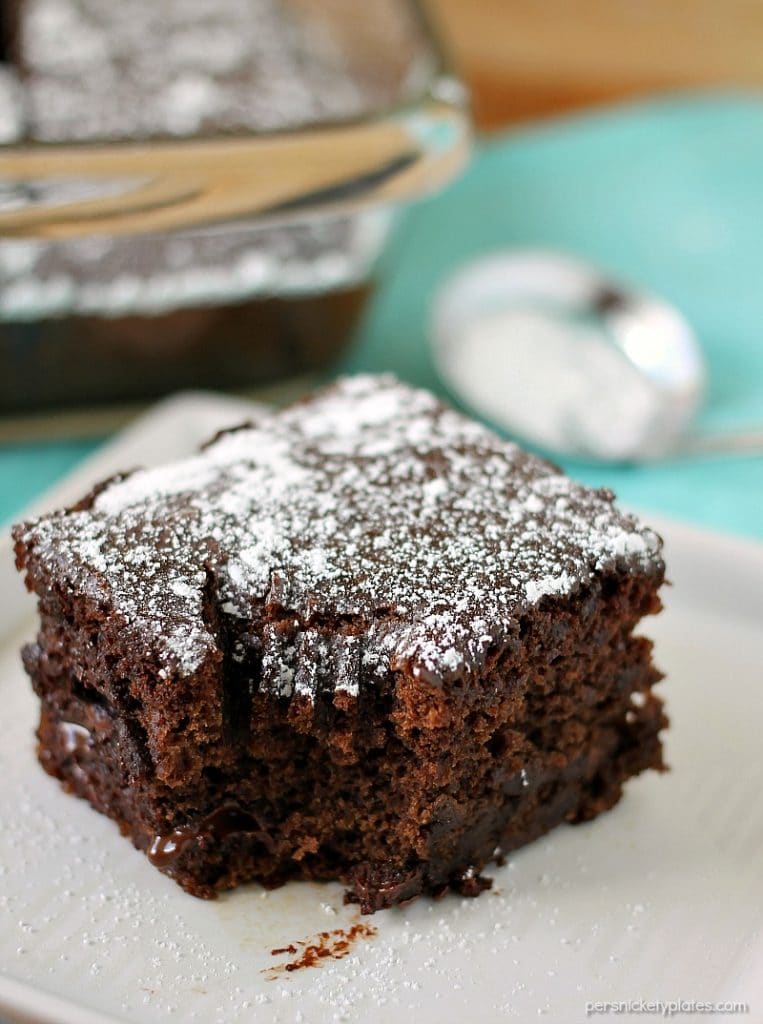 slice of chocolate cake with a bite taken out of it