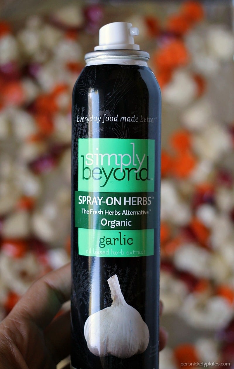 Garlic Roasted Veggies are a mix of cauliflower, carrots, and red skin potatoes tossed in olive oil and garlic and roasted to perfection. | www.persnicketyplates.com