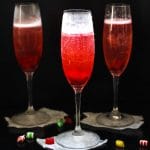 This Cranberry Prosecco Spritzer combines the vibrant bubbles of Riondo Prosecco with the warm winter notes of spearmint and cranberries. It's the perfect accompaniment to wrapping gifts and spending time with family and friends around the fire or in the kitchen. | www.persnicketyplates.com