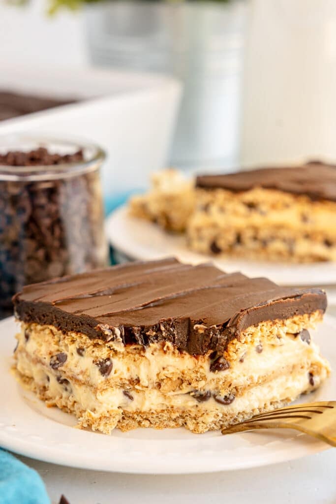 slice of chocolate eclair dessert with a bite missing.