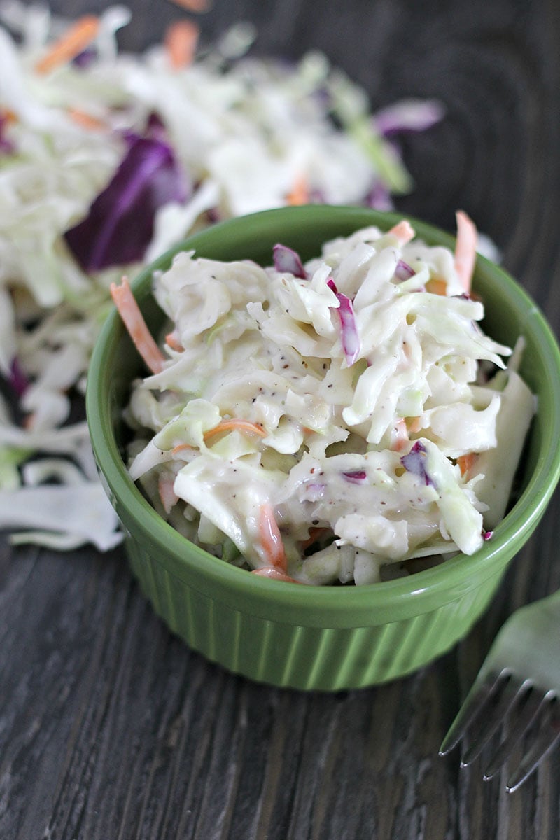 creamy coleslaw in green bowl