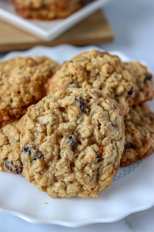 white plate with oatmeal raisin cookies