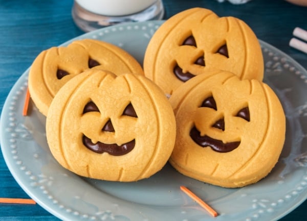 friendly, happy orange jack-o-lantern sugar cookies