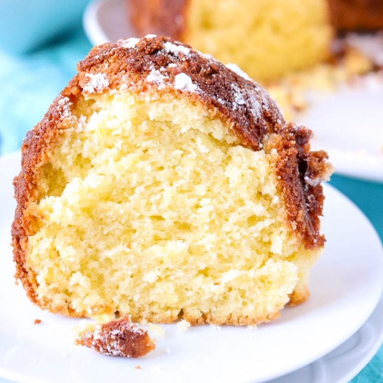 slice of lemon bundt cake on white plate