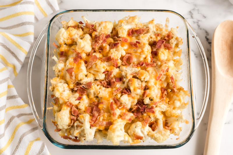 overhead shot of cauliflower casserole topped with bacon