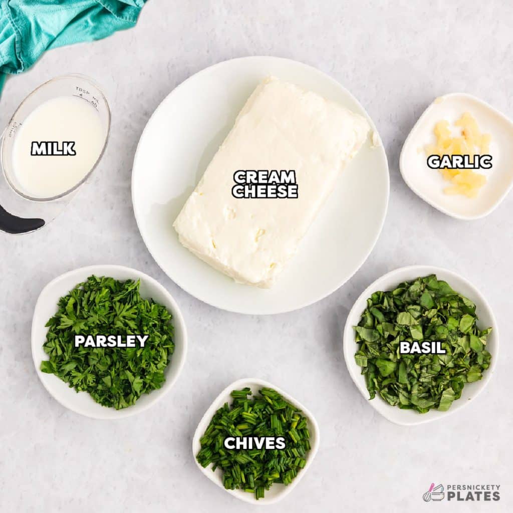 overhead shot of labeled ingredients to make garlic herb dip.