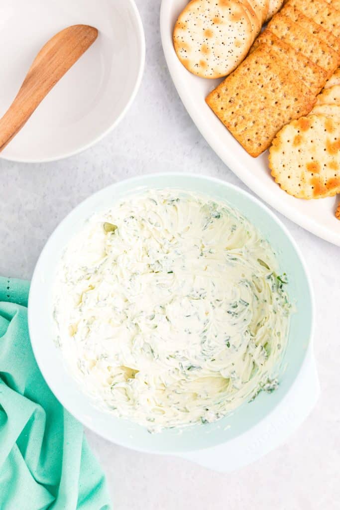 garlic herb dip in a mixing bowl.