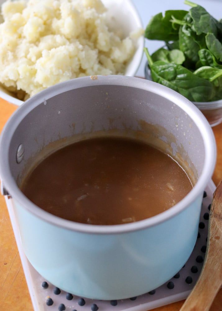 brown gravy in a saucepan