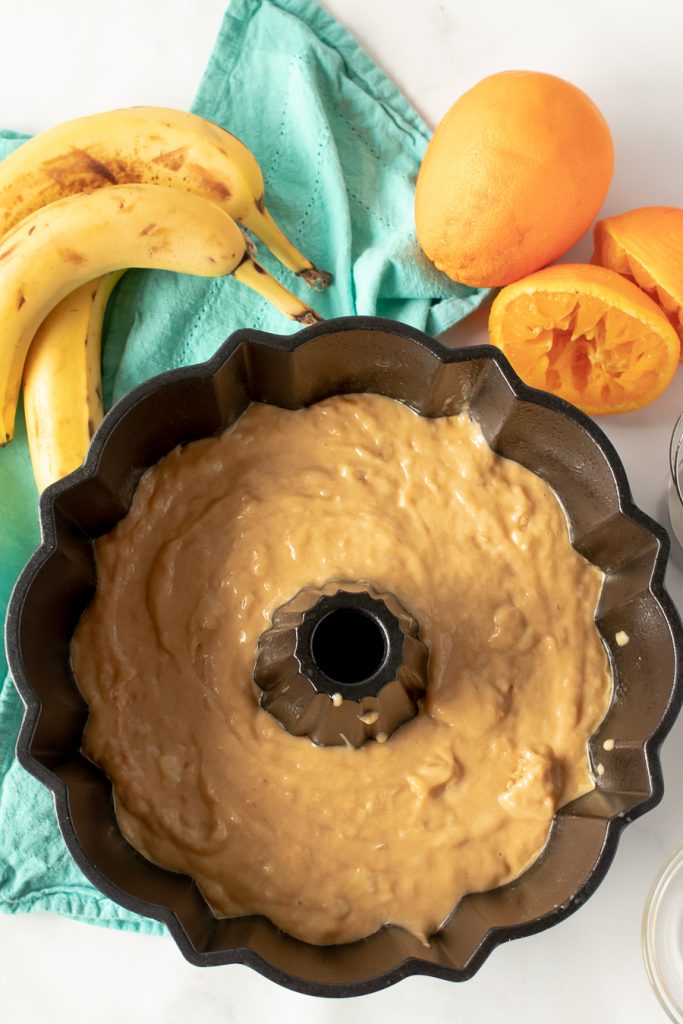 overhead shot of cake batter in a bundt pan
