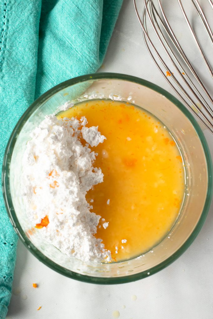 overhead shot of bowl making cake glaze