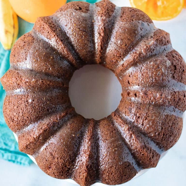 overhead shot of glazed orange banana bundt cake