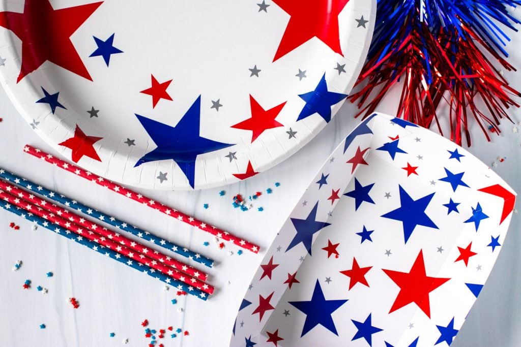overhead shot of patriotic paper plates & party supplies